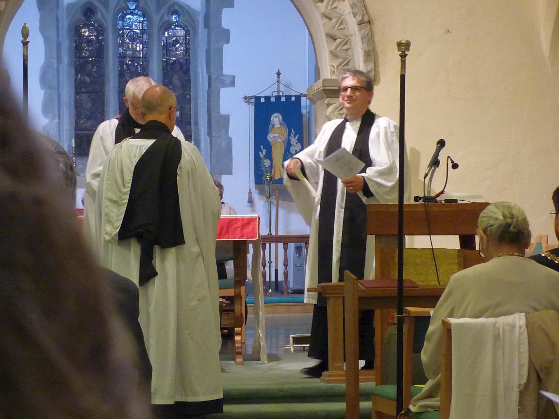 Archdeacon and Vicar to left, Area Dean to right